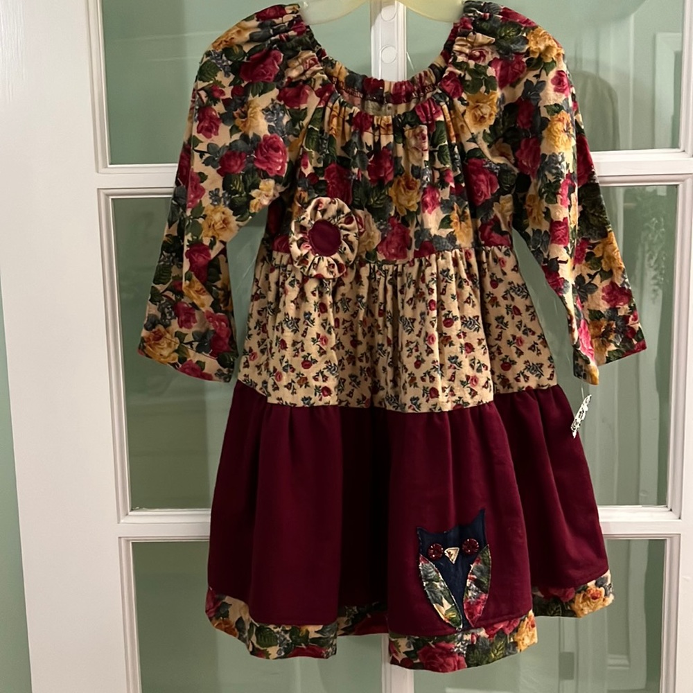 New handmade girls’ three tiered flannel dress in a size 3.